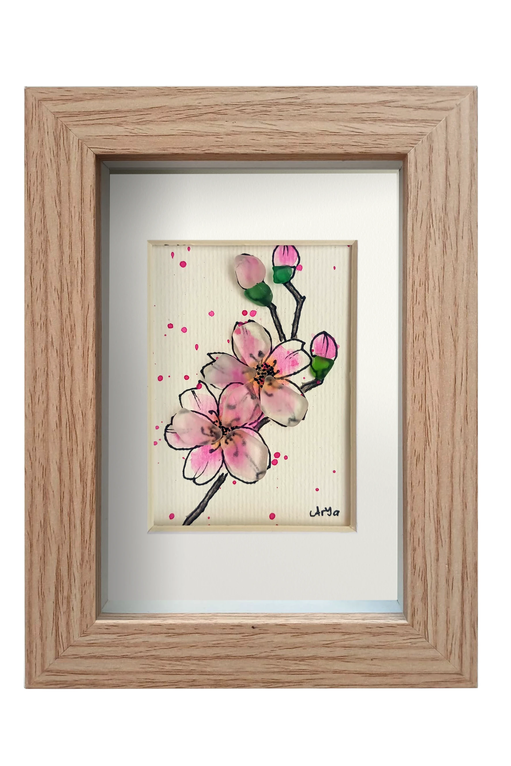 Cuadro con dibujo de rama de almendro con flores de tinta y acuarela con vidrio de mar resaltando los pétalos y los capullos