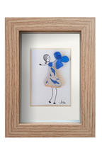 Chica danzando en azul