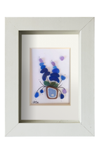 Maceta de flores lilas