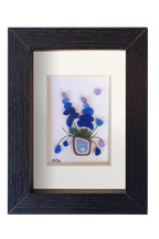 Maceta de flores lilas