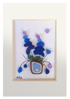 Maceta de flores lilas