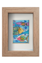 Colorido cuadro con dibujos de peces tropicales