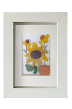 Girasoles en maceta