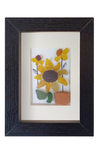 Girasoles en maceta